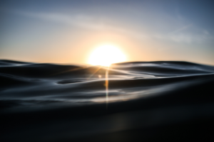 Photo of sunrise on water
